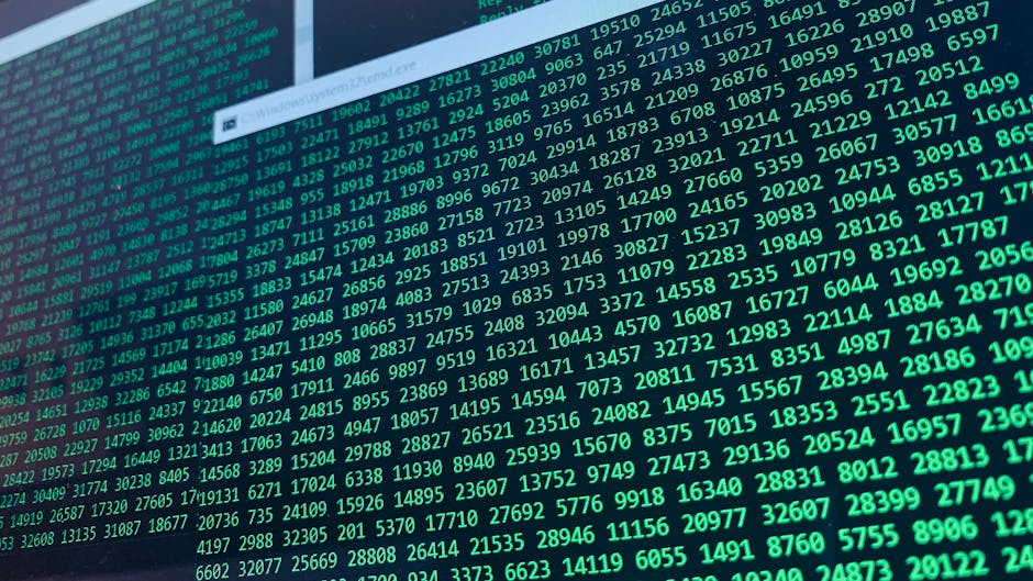 Security team monitoring an encrypted log pipeline dashboard on a workstation