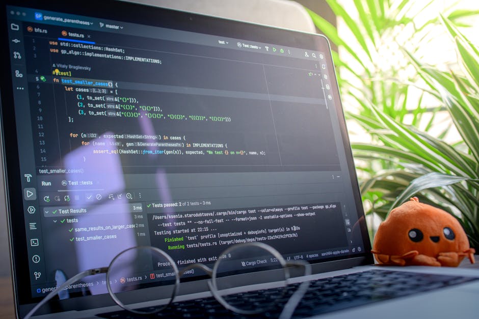 Developer running a local test harness with logs and containers on a laptop