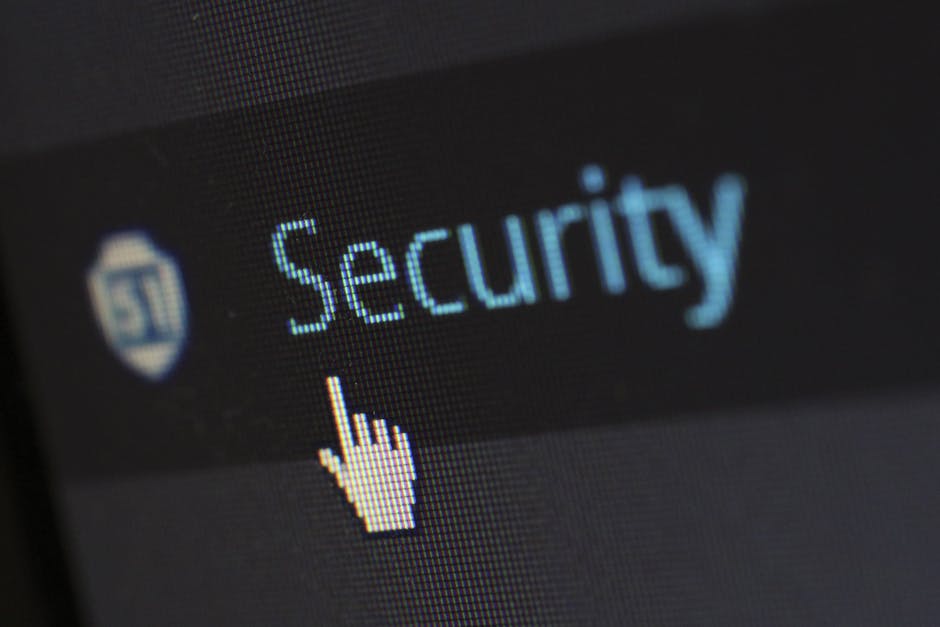 IT team configuring a firewall or security settings on monitors during an incident response