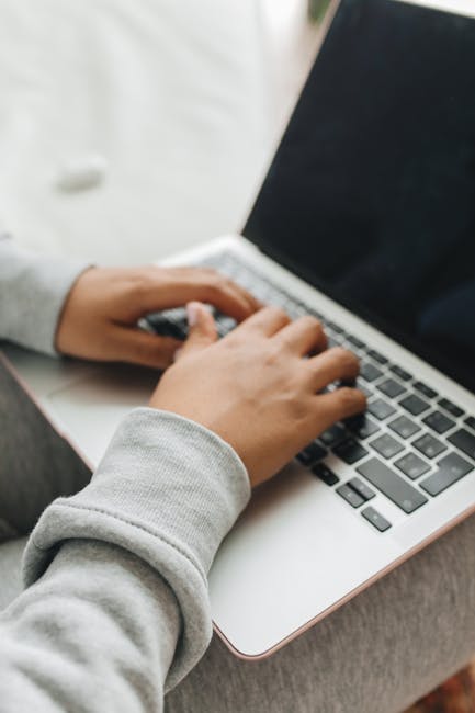 Developer implementing secure login with password hashing and protected sessions