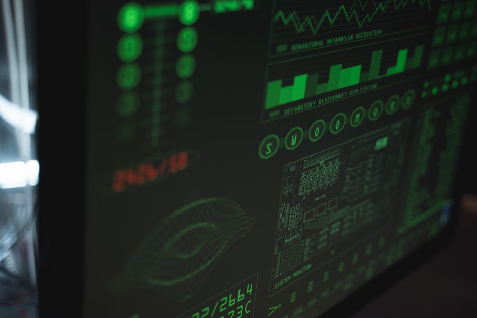 Engineer viewing centralized security log events and alerts on a monitor screen