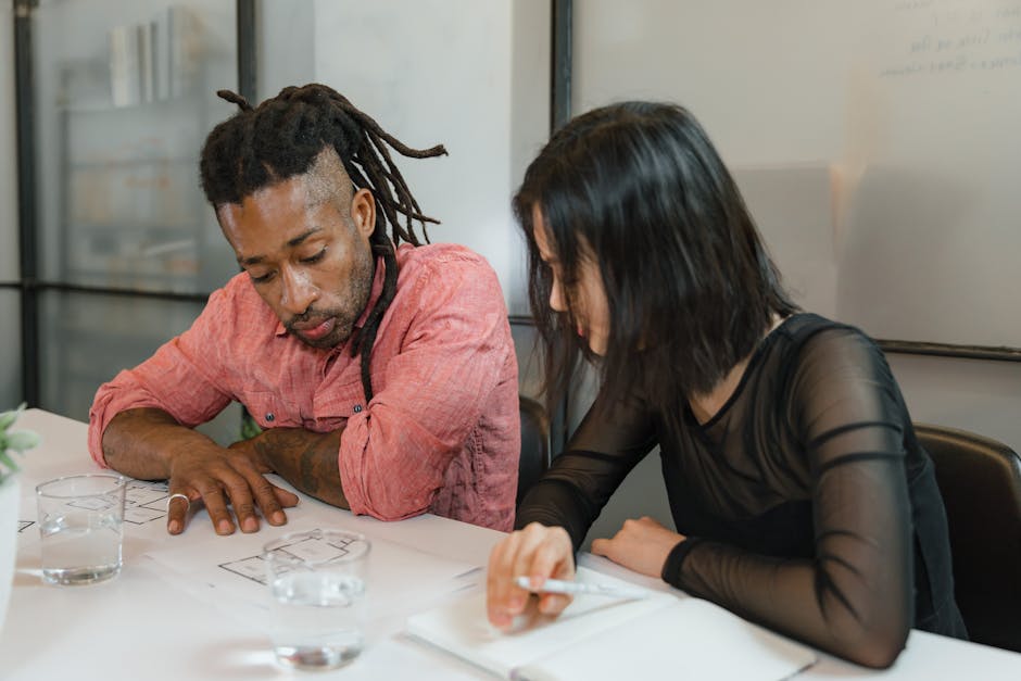 IT and security team collaborating to prioritize a patch queue and action plan