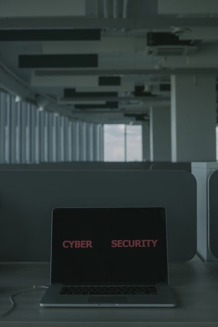 Analyst reviewing network access and login activity on multiple screens