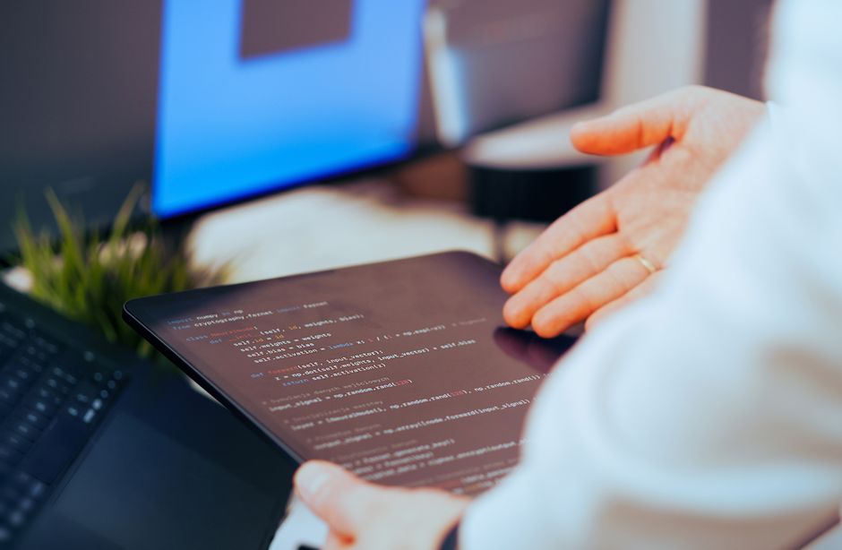 Engineer looking at CI/CD dashboard with security checks and failing build indicators