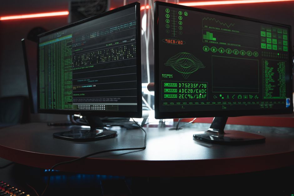 Security team monitoring alerts and identity access controls in a operations room